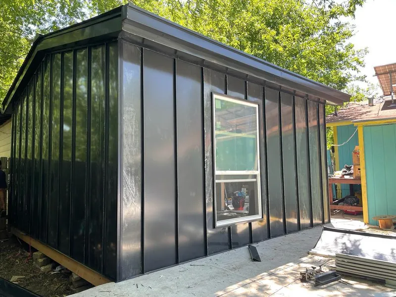 Black standing seam metal wall panels for Metal Roof Installation in Norton Shores