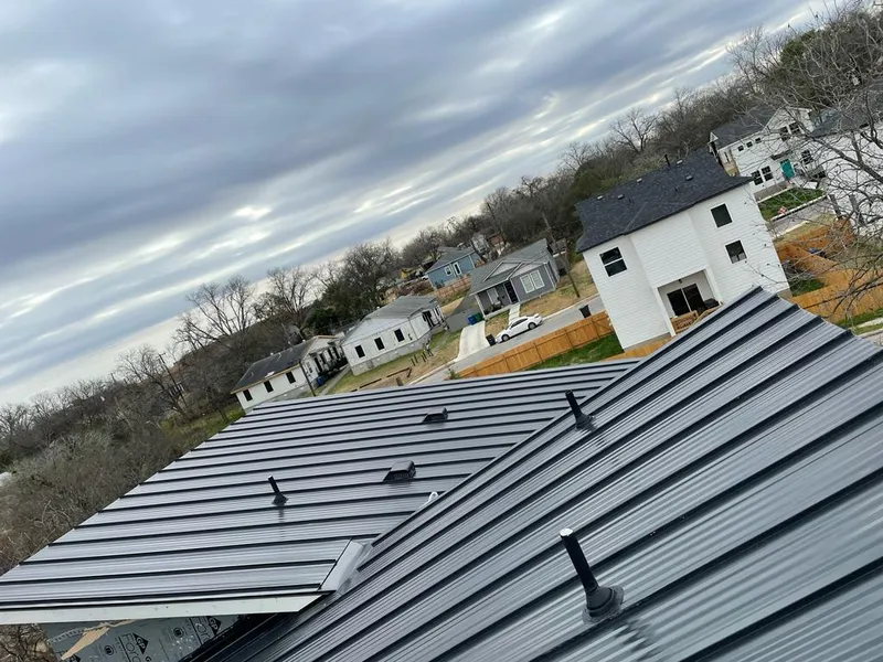 Standing seam metal roof panels with vents for Skylight Repair in Norton Shores
